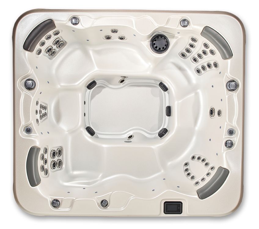 Top-down view of an empty beige hot tub with multiple jet configurations, gray headrests, and a square design.