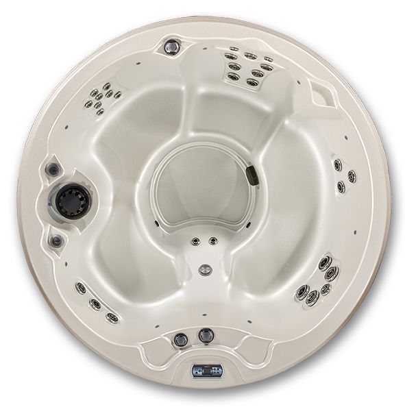 Top-down view of a circular off-white hot tub with various massage jets and seating indentations.