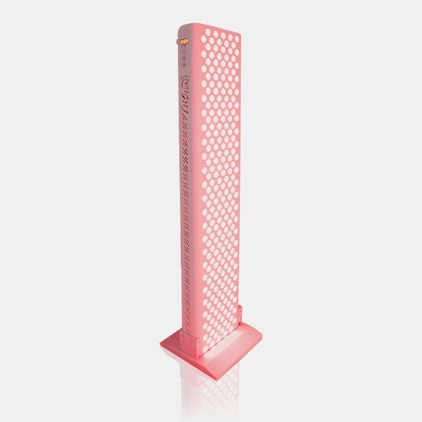 A tall, pink, rectangular red light therapy device standing on a matching base with a grid of circular light emitters.