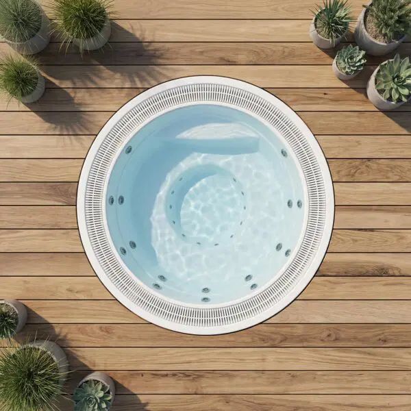 A circular hot tub with light blue water, set into a wooden deck and surrounded by small potted plants.