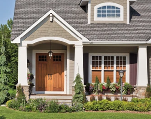 house with two main wooden doors