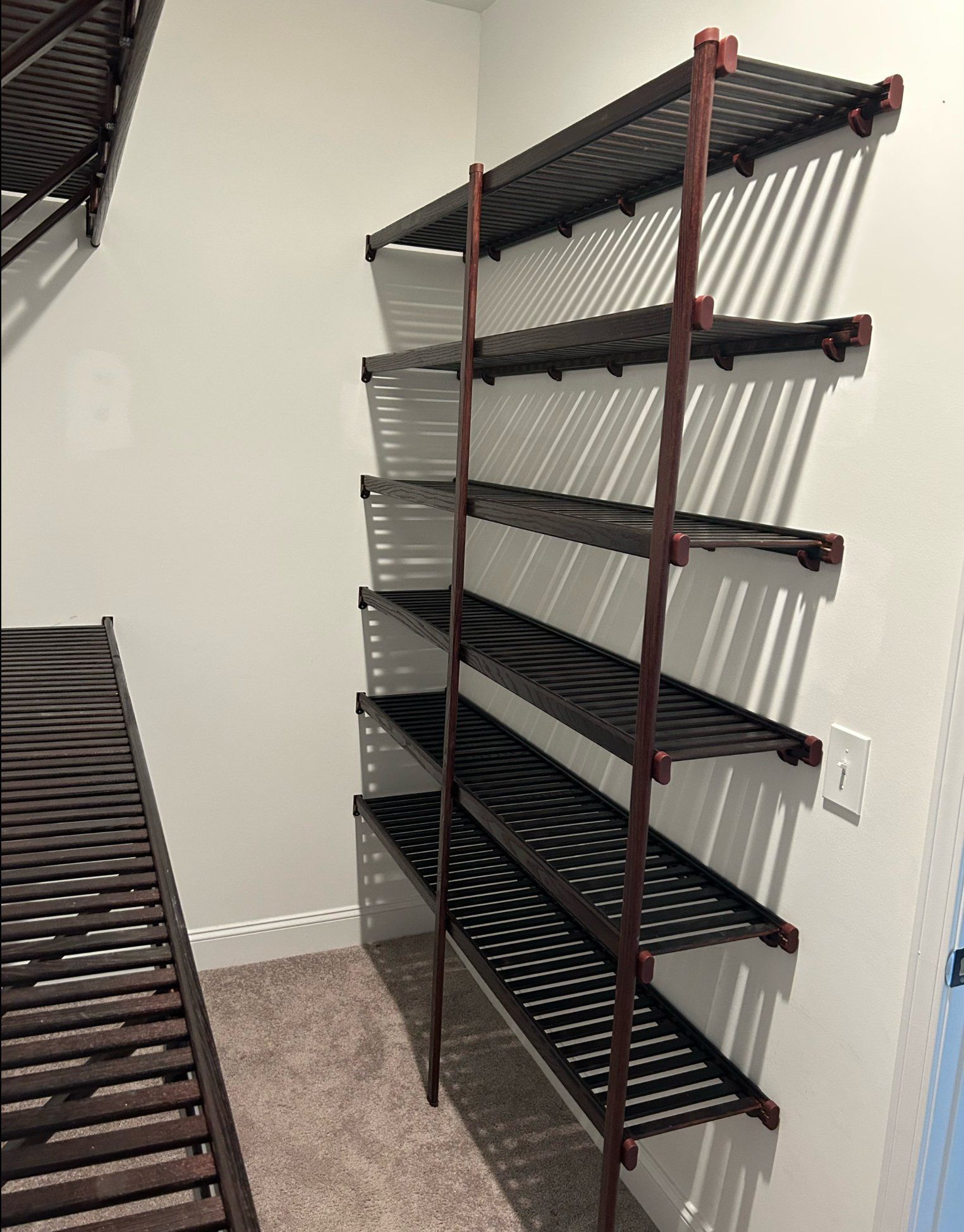 A closet with a bunch of shelves in it