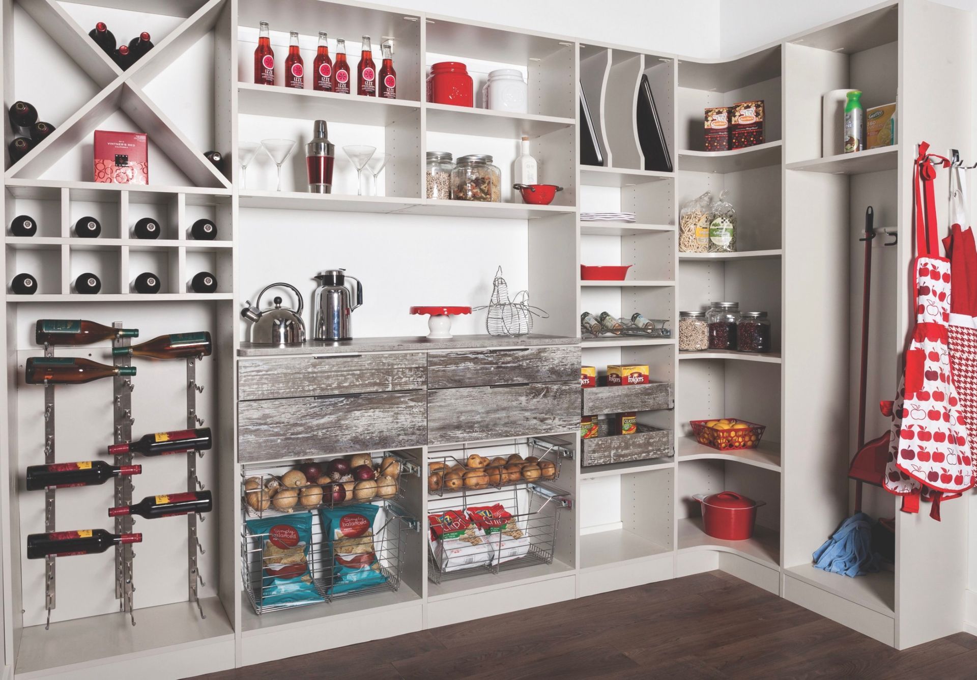 A pantry with lots of shelves and bottles of wine.