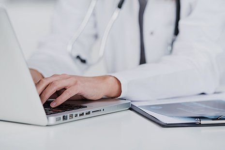 Physician keeping patient's medical information