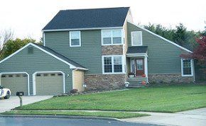 Blue-green colored house