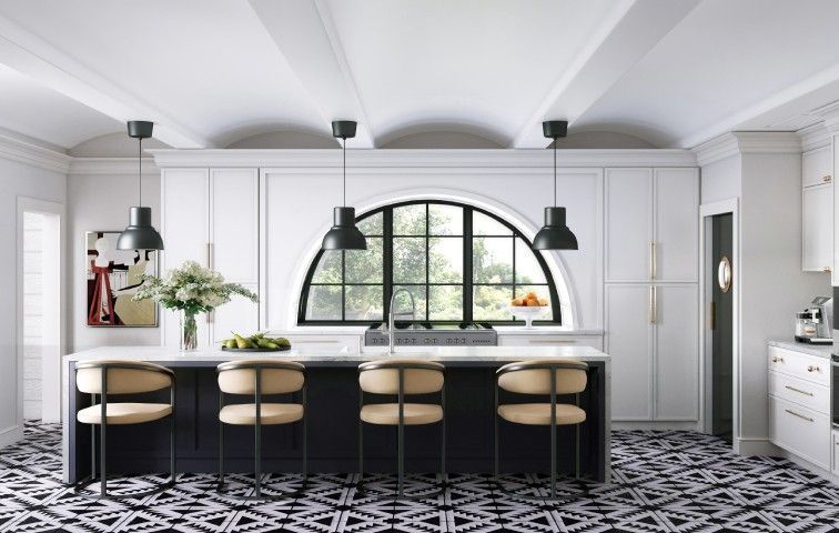 A black and white kitchen with a large island and stools