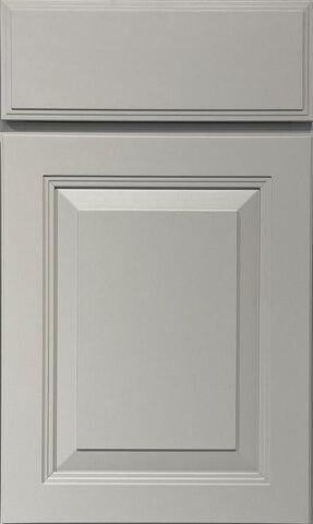 A close up of a white cabinet door on a white background.