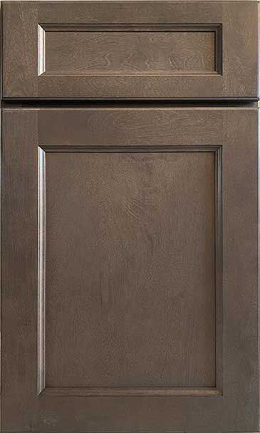 A close up of a brown wooden cabinet door.