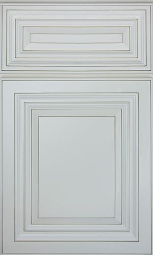 A close up of a white cabinet door with a drawer.