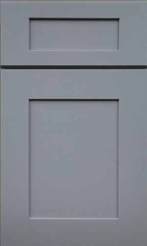 A close up of a gray cabinet door on a white background.