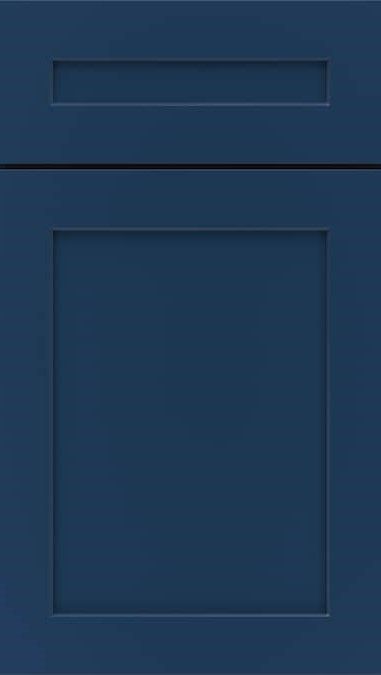 A close up of a blue cabinet door on a white background.