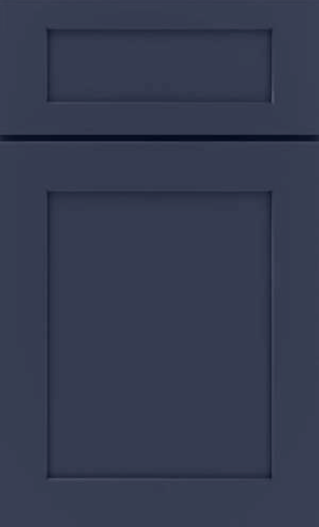 A close up of a blue cabinet door on a white background.