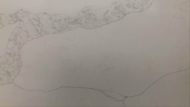 A close up of a pencil drawing on a piece of paper.