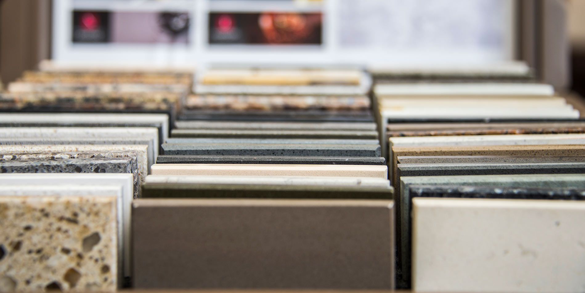 A bunch of tiles are sitting on top of each other on a table.