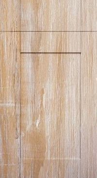 A close up of a wooden door with a square hole in it.