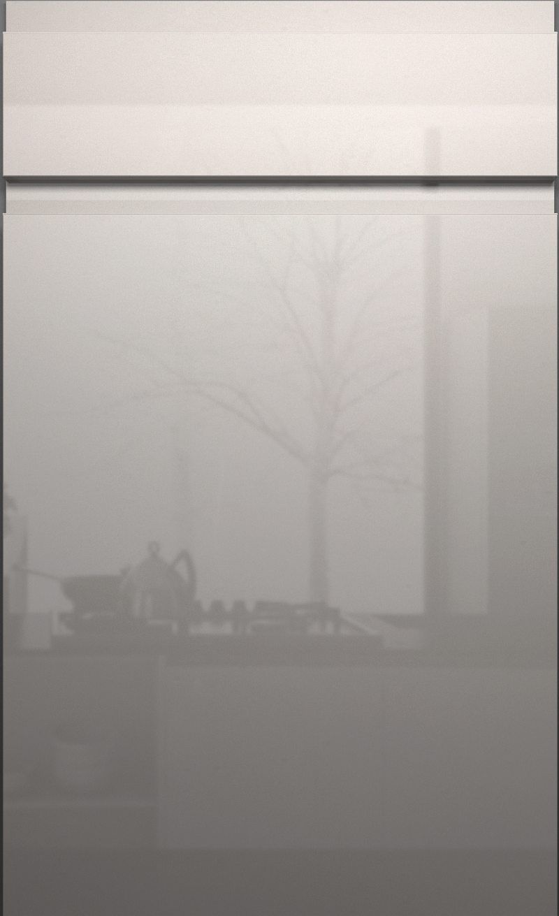 A close up of a glass door with a tree in the background.