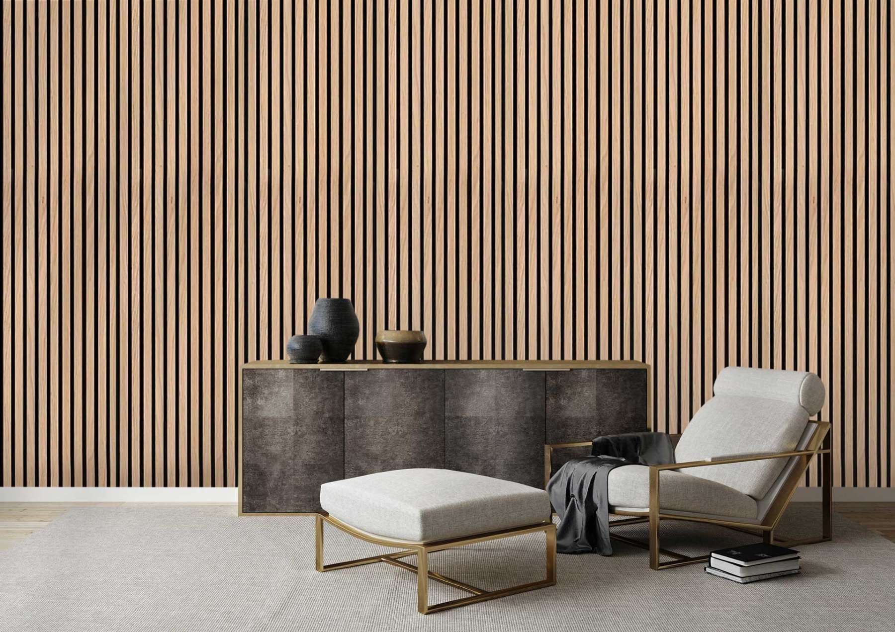 A living room with a chair , ottoman and striped wallpaper.