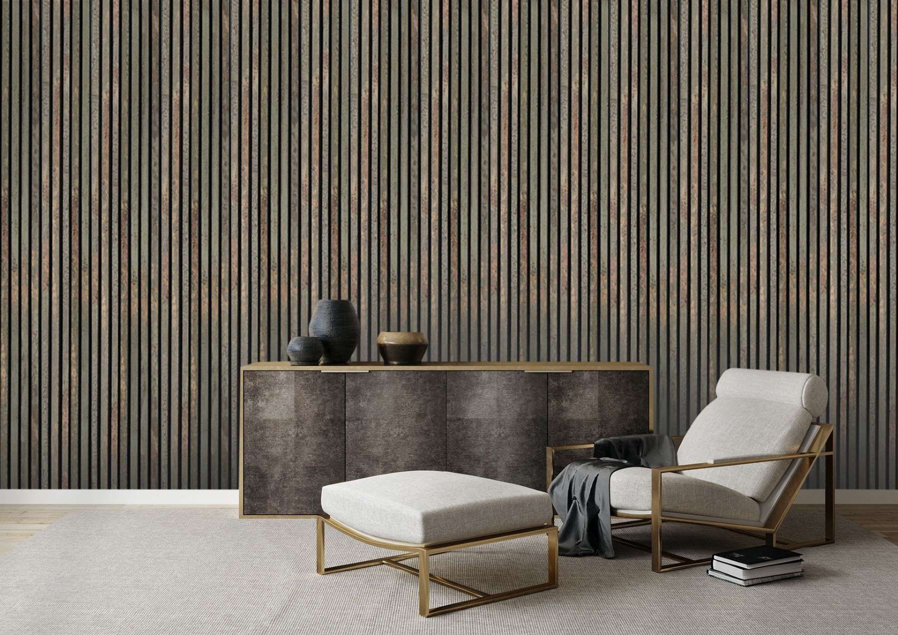 A living room with a chair and ottoman in front of a wooden wall.