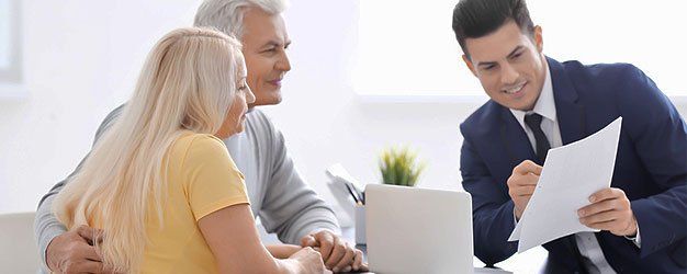 Senior couple meeting with consultant
