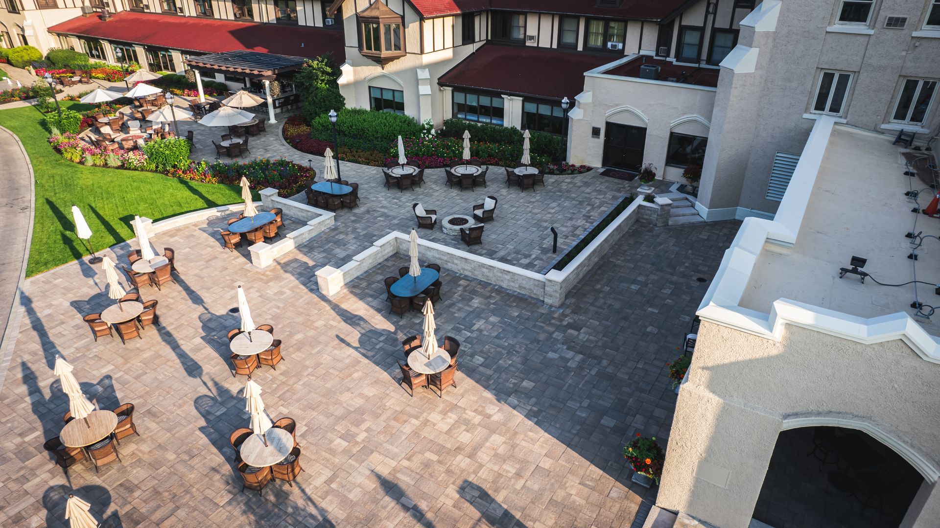 An aerial view of a patio with tables and chairs