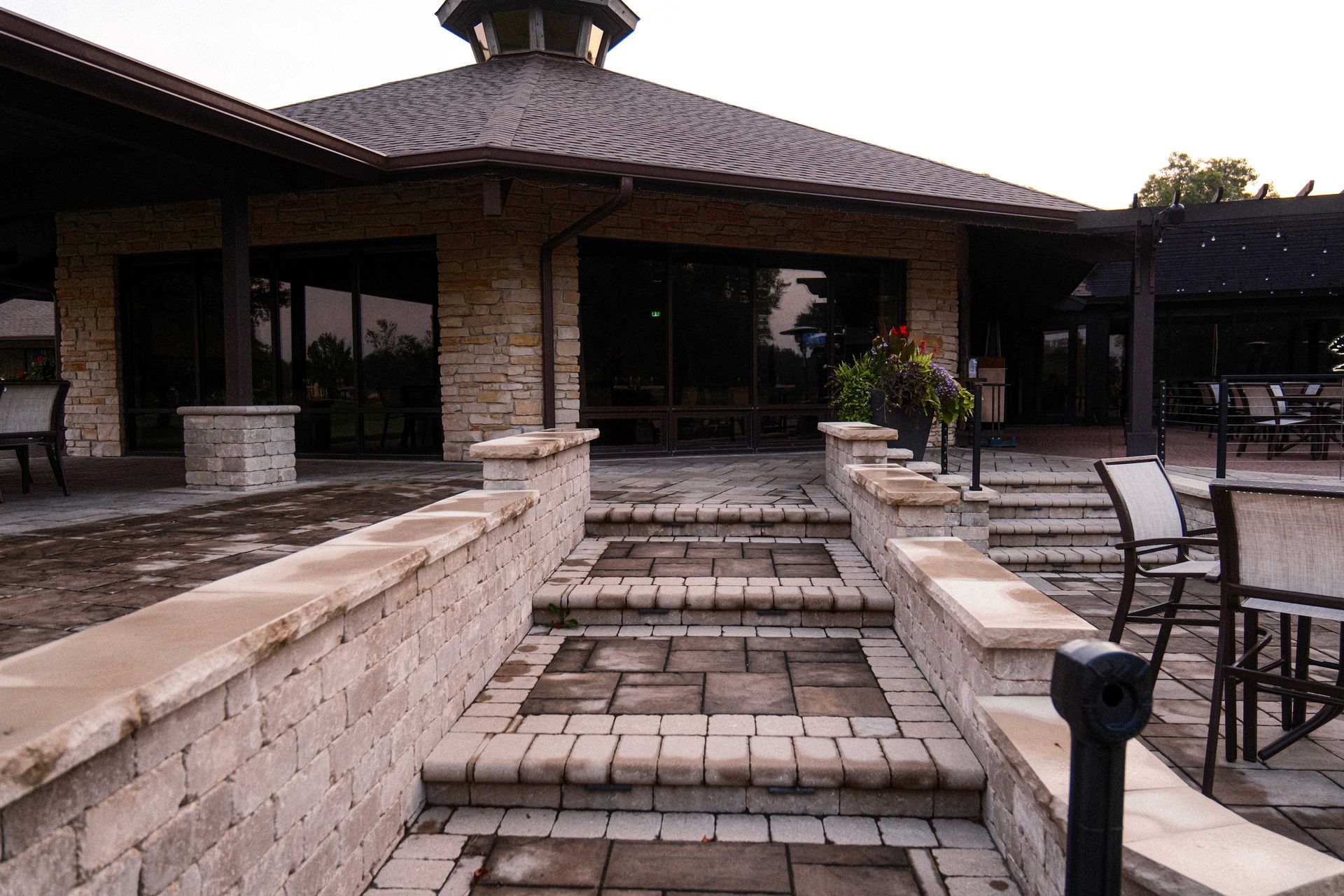 A stone building with stairs leading up to it