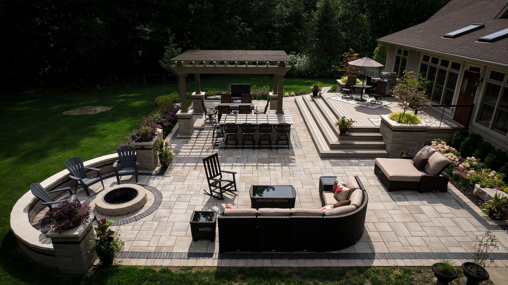 There is a fire pit in the middle of the patio.