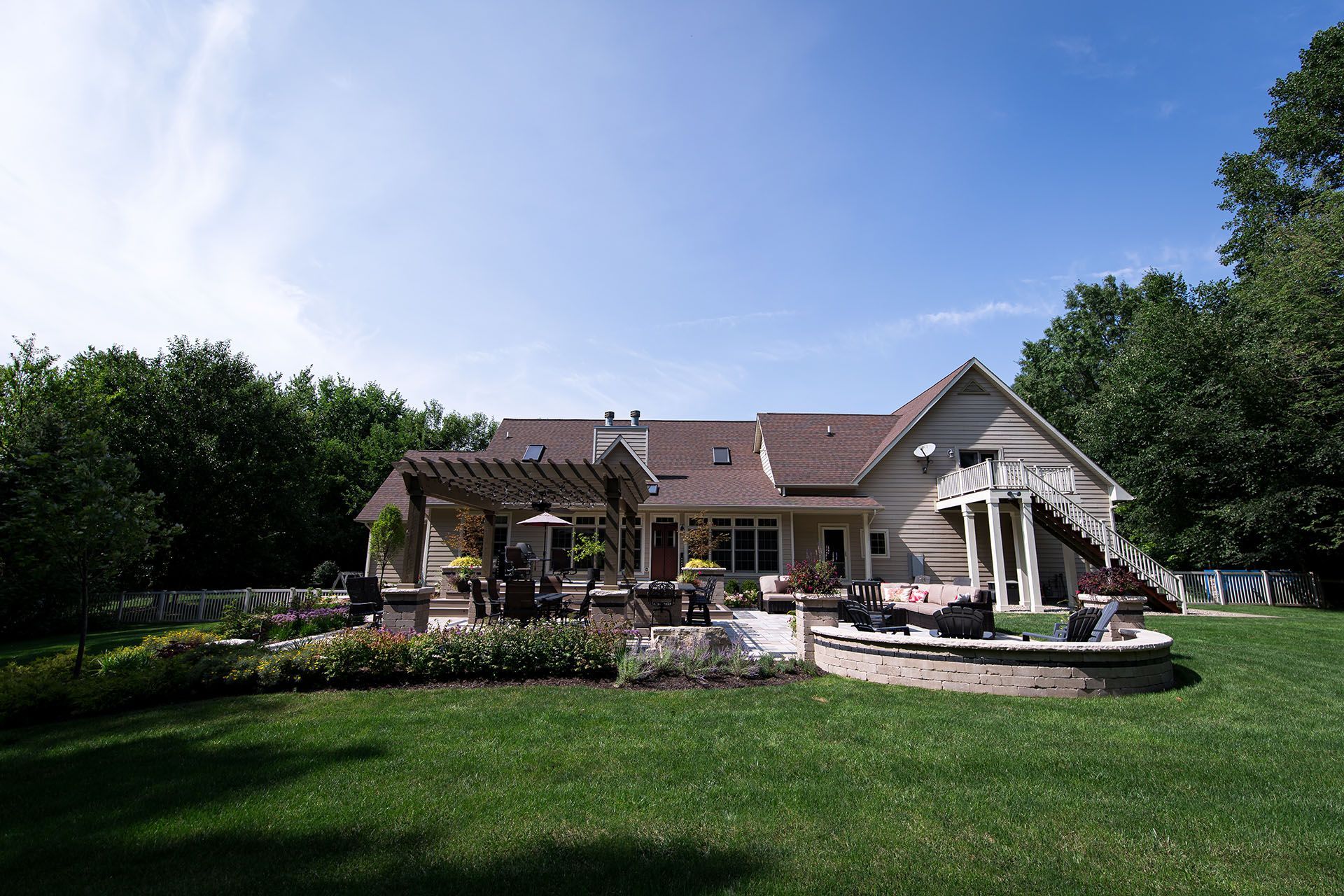 A large house with a large lawn in front of it