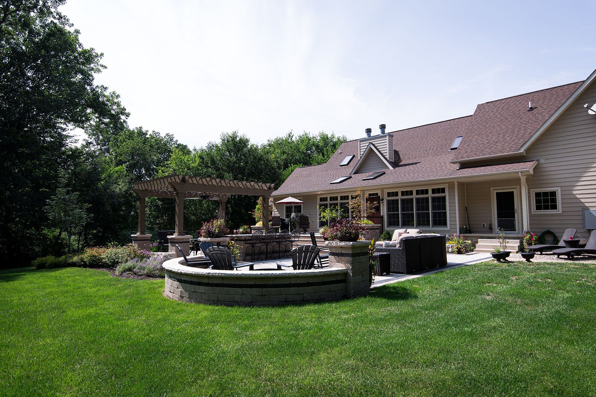 A large house with a large lawn in front of it