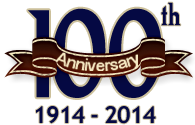 100th Anniversary emblem in blue, brown, and gold with “1914–2014” text and ribbon banner