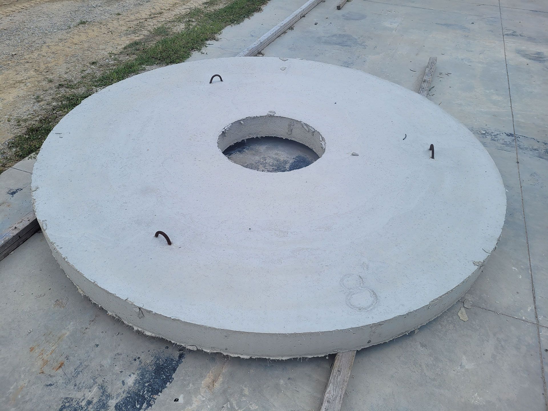 A large concrete circle with a hole in the middle