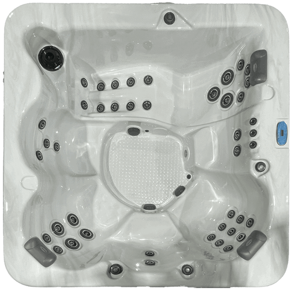 Top-down view of a white hot tub with multiple black jets and gray headrests
