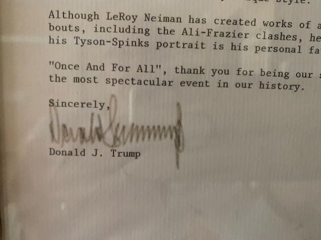 Close-up of a typed Donald J. Trump letter ending with his signature and a quoted line.