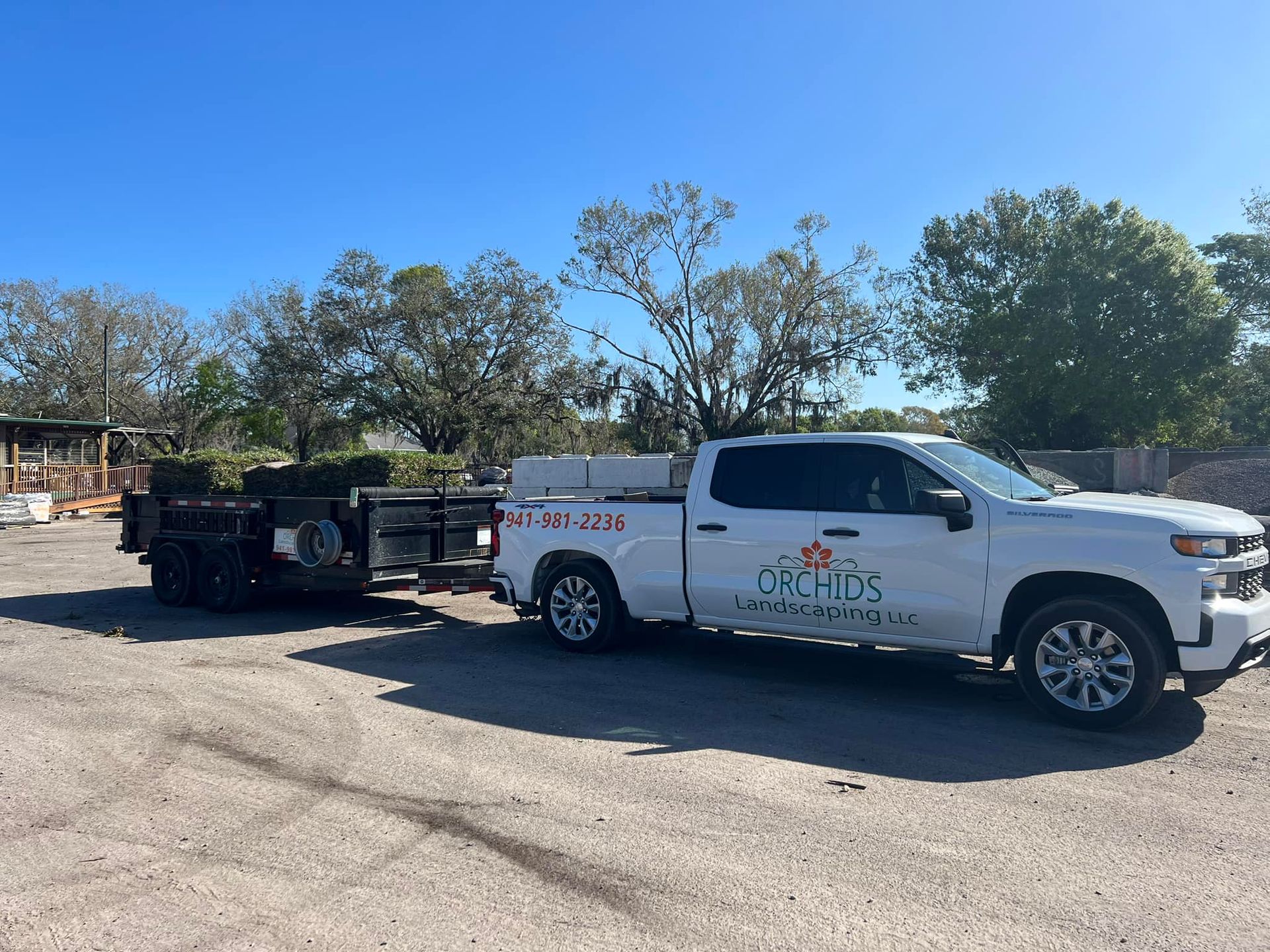 White pickup truck with trailer, 