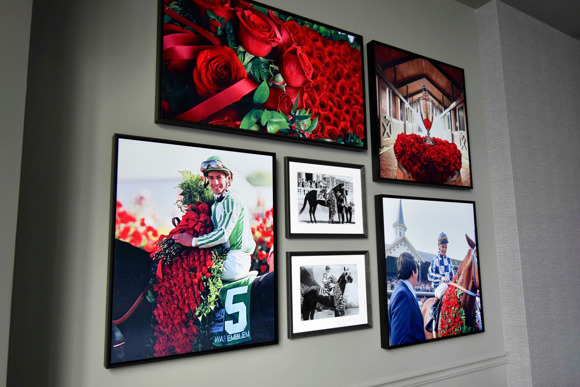 Wall art with Derby Day photos and roses.