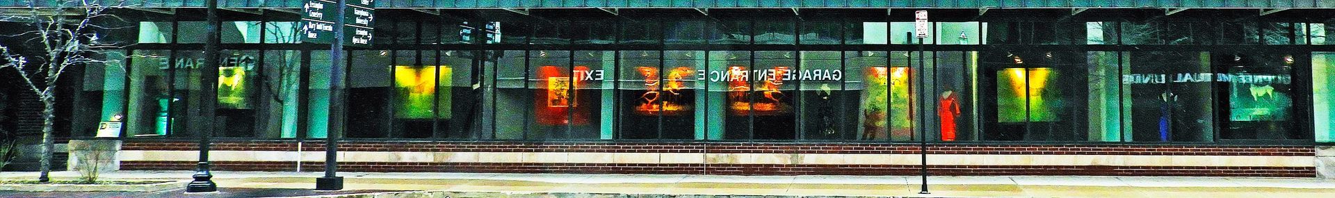 Building with colorful illuminated signage.