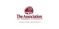 Logo of The Association of Former Students, Texas A&M University. Features a maroon helmet icon above text.
