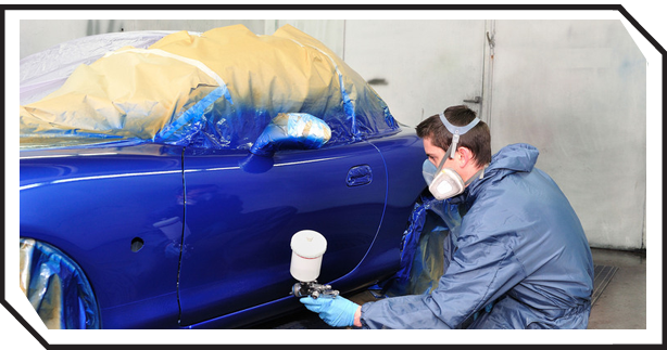 mechanic repainting auto