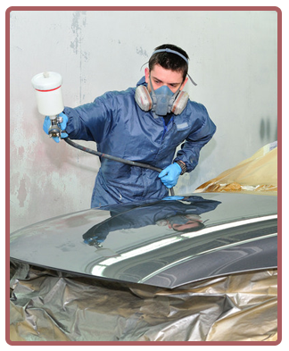 mechanic repainting auto