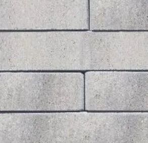 Gray brick wall, rectangular blocks, horizontal pattern.