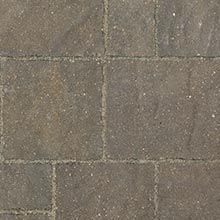 Brown rectangular paving stones arranged in a pattern.