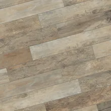 Wooden floor with a rustic, distressed appearance in varying shades of brown and gray.