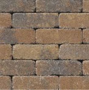 Brown and tan stone tile flooring with a textured surface.