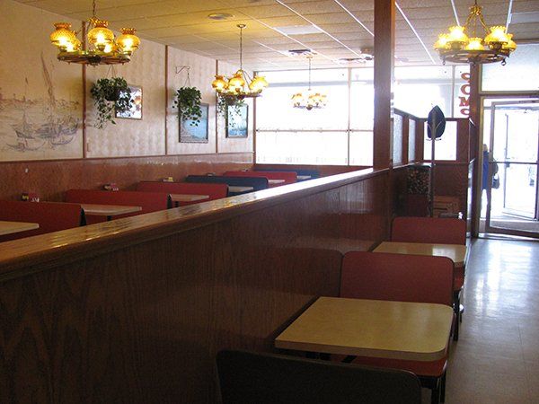 Table and seats inside the restaurant