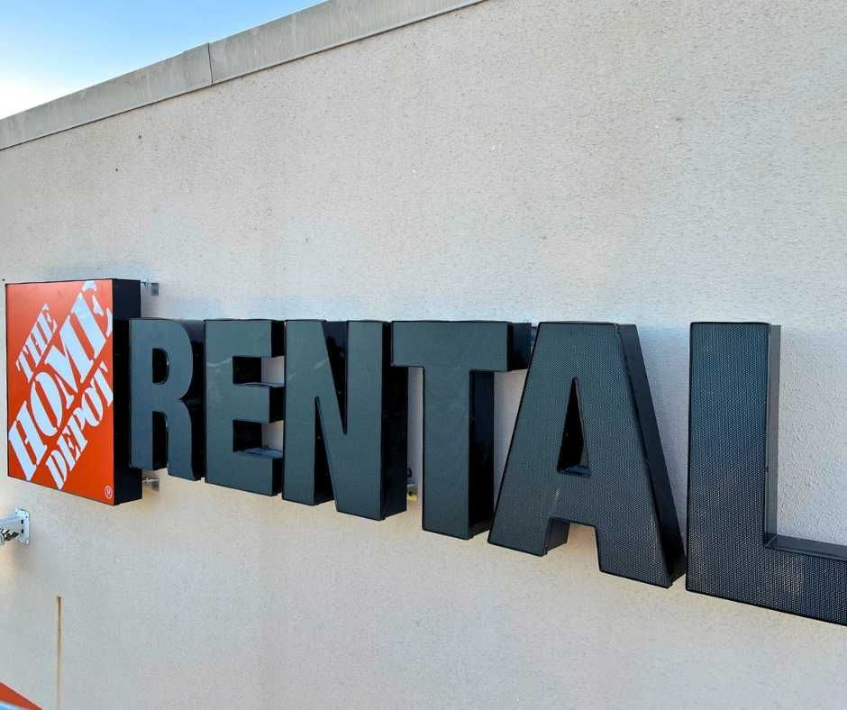 The Home Depot Rental sign featuring the company's orange logo next to large, black 3D letters