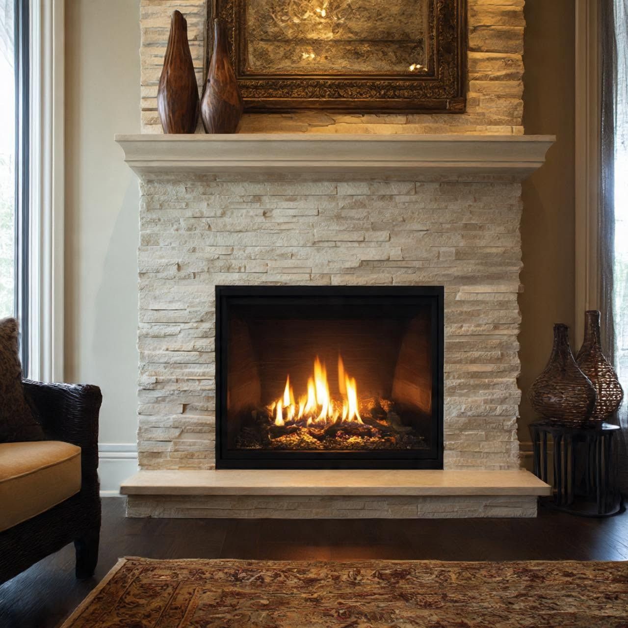 Cozy living room fireplace with a lit fire, white stone surround, and decorative vases on the mantel.