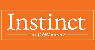 The logo for instinct the raw brand is orange and white.