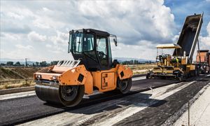 A road roller on the tar road