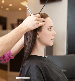 young woman getting a new haircut