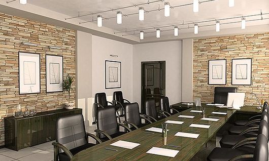 Meeting room with stone wall