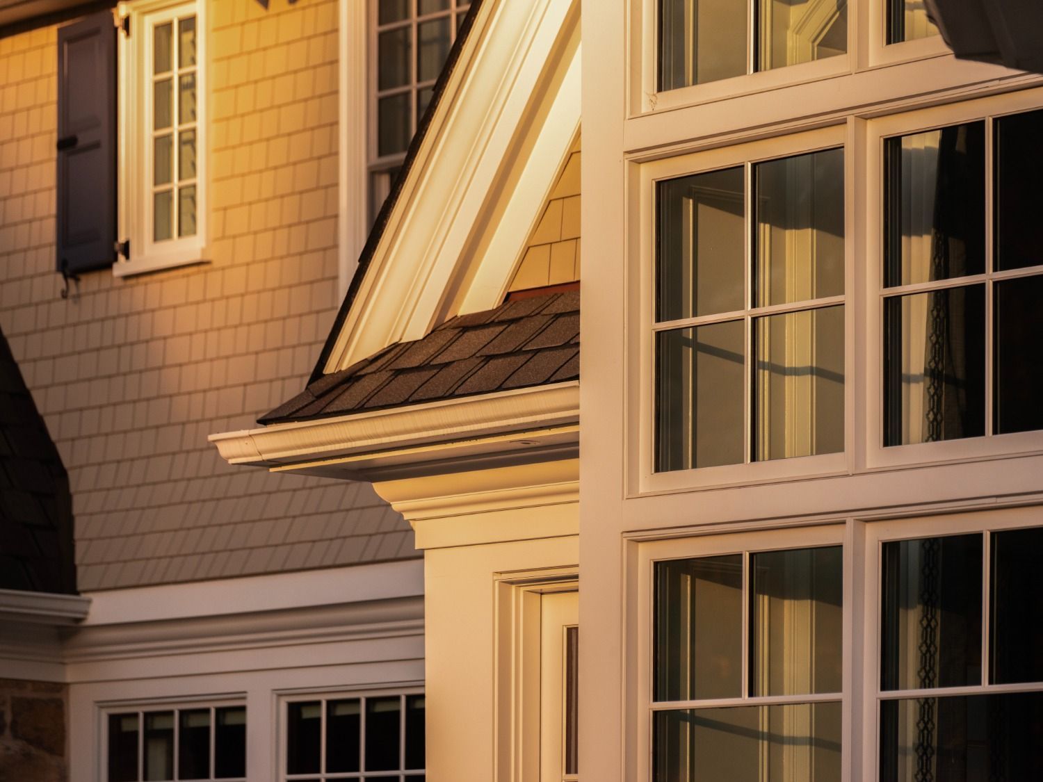 A close up of a house with lots of windows